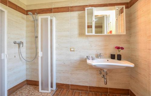a bathroom with a sink and a shower at Casa Marina in Santa Margherita