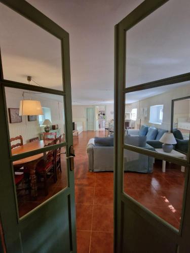 a living room with a couch and a table at Casa Rural Luna in Candeleda