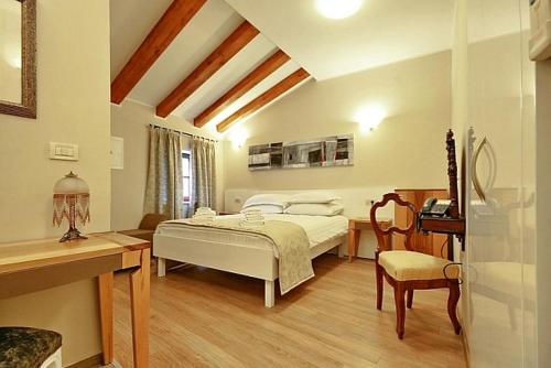 Posteľ alebo postele v izbe v ubytovaní Boutique Hotel Vela Vrata