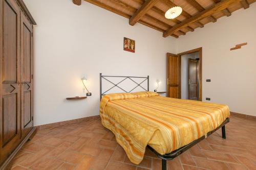 Кровать или кровати в номере Isolotto - Appartamento Pino