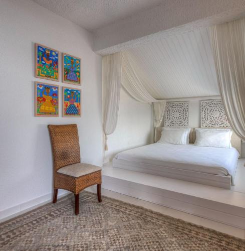 Ένα ή περισσότερα κρεβάτια σε δωμάτιο στο Luxury Villas Skiathos