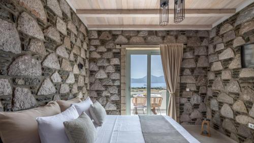 Postel nebo postele na pokoji v ubytování Thea Sunset Suites