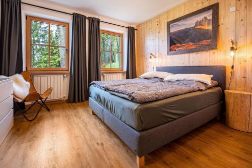 Un pat sau paturi într-o cameră la Valentin36 Apartment Geisler
