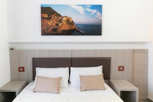 Posteľ alebo postele v izbe v ubytovaní Eden Rooms