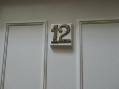 a door with a number on it next to two doors at The Cumberland in Llandudno