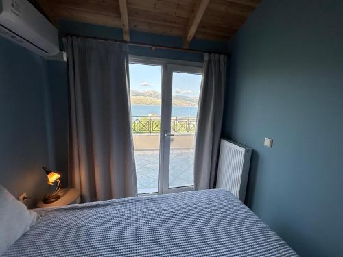 Postel nebo postele na pokoji v ubytování Emelia Apartment