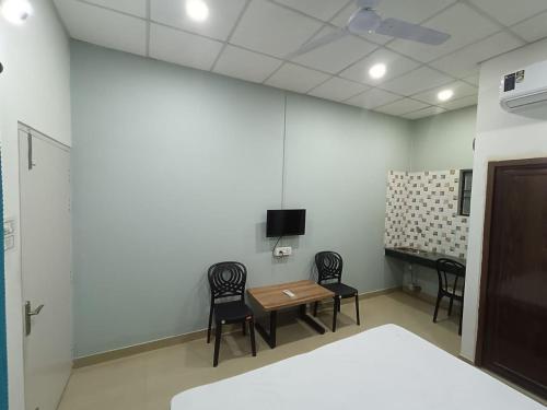 TV a/nebo společenská místnost v ubytování The Corner Inn (Lodge)