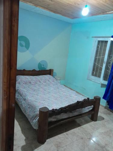 Una cama o camas en una habitación de Los Carolinos