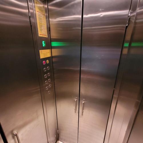 a close up of a metal elevator in a subway at Anastasia Apr 28B Beautiful View in Bucharest