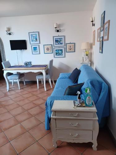 a bedroom with a bed and a table and a desk at CASA RE.ALE in Viterbo