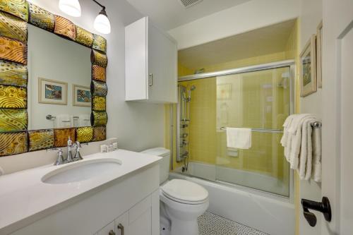 a bathroom with a sink and a toilet and a shower at St Augustine Vacation Rental with Private Hot Tub! in St. Augustine