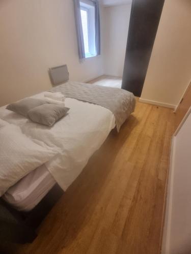 Postel nebo postele na pokoji v ubytování 1bedroom Apartment in City centre