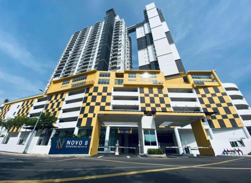a large building with yellow and black squares on it at The Ambiance, Melaka in Melaka