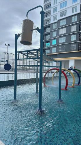 a water park with a playground in the water at The Ambiance, Melaka in Melaka