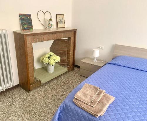Postel nebo postele na pokoji v ubytování Ravenna Suite