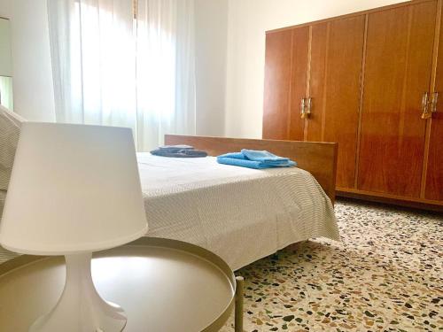 Postel nebo postele na pokoji v ubytování Ravenna Suite