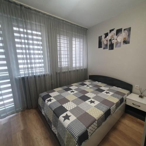 Postel nebo postele na pokoji v ubytování Apartment Voivoda