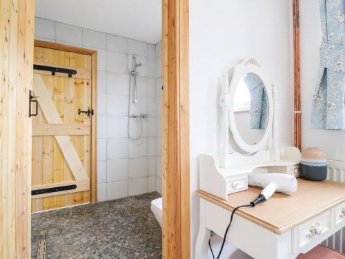 a bathroom with a sink and a mirror at Valley View in Ashbourne