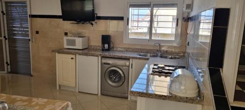Kuchyň nebo kuchyňský kout v ubytování Appartement Mirador
