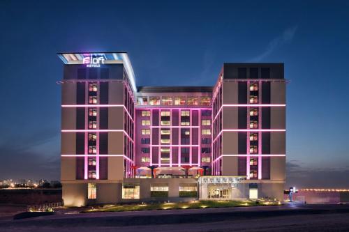 a rendering of a hotel at night at Aloft Muscat in Muscat