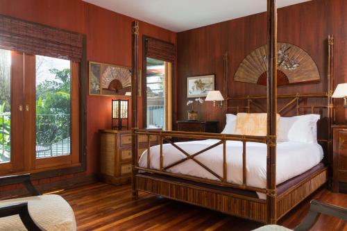 Llit o llits en una habitació de Holualoa Inn