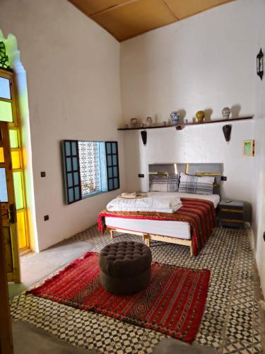 Voodi või voodid majutusasutuse Riad Ali Baba Fes toas