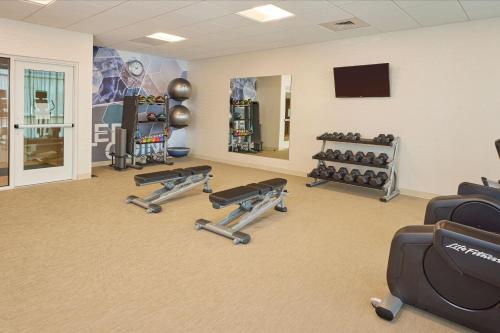 a fitness room with treadmills and weights at SpringHill Suites by Marriott Medford Airport in Medford