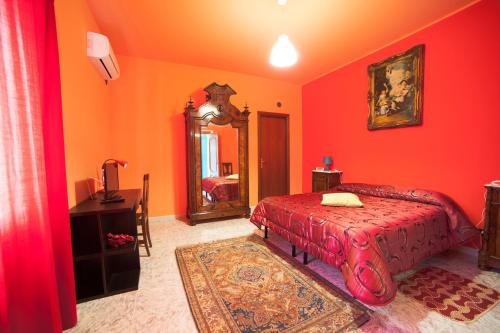Łóżko lub łóżka w pokoju w obiekcie La Dimora di Samu