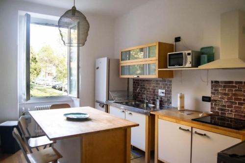 Appartamento vista giardino - L'onda blu tesisinde mutfak veya mini mutfak