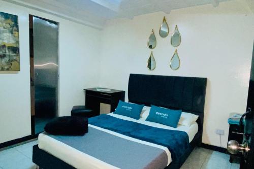 Cama o camas de una habitación en Hotel Bogota Home