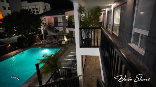 a view of a swimming pool from a balcony at Devon Shores in Clearwater Beach