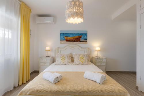 Ένα ή περισσότερα κρεβάτια σε δωμάτιο στο Bambus House Blue