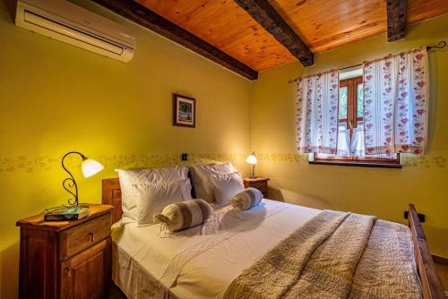 Postel nebo postele na pokoji v ubytování Villa Gora