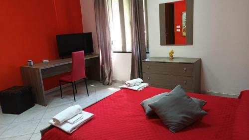 Postel nebo postele na pokoji v ubytování B&B La Stazione