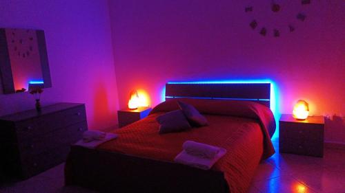 Postel nebo postele na pokoji v ubytování B&B La Stazione