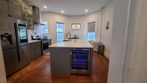 a kitchen with a sink and a counter top at Gorgeous Victorian House!! Entire suite in SAM's home in Brooklyn