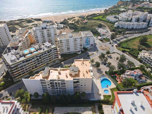 an aerial view of the beach and buildings at Mare Nostrum in Armação de Pêra