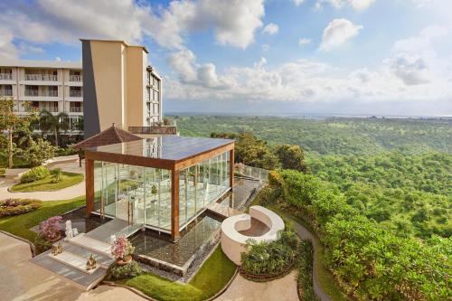 an aerial view of a building with a glass facade at Four Points by Sheraton Bali, Ungasan in Jimbaran