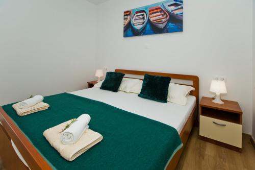 Ένα ή περισσότερα κρεβάτια σε δωμάτιο στο Forr Apartments - Hvar, Croatia