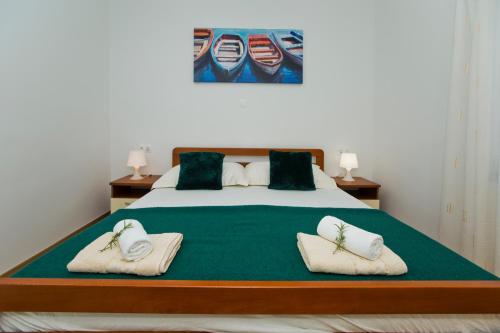 Ένα ή περισσότερα κρεβάτια σε δωμάτιο στο Forr Apartments - Hvar, Croatia