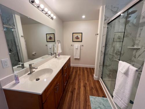 a bathroom with a sink and a shower at Cozy Custom Vacation Home in Kaneohe