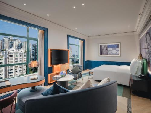 Hotel Indigo Shenzhen Overseas Chinese Town by IHGにあるシーティングエリア