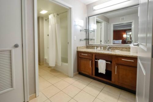 a bathroom with a sink and a mirror at Residence Inn by Marriott Hazleton in Hazleton
