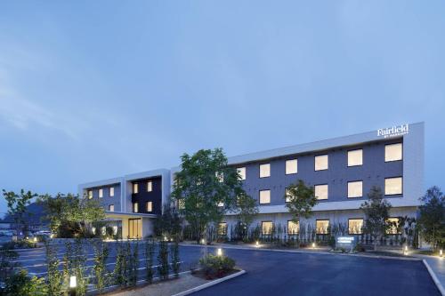 a rendering of a hotel with a parking lot at Fairfield by Marriott Mie Okuise Odai in Odaicho