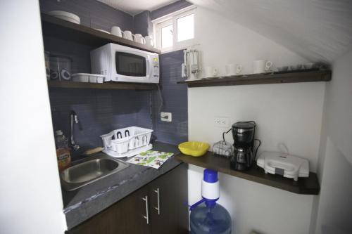 Kuchyň nebo kuchyňský kout v ubytování Hospedaje Solymar II Sarie Bay