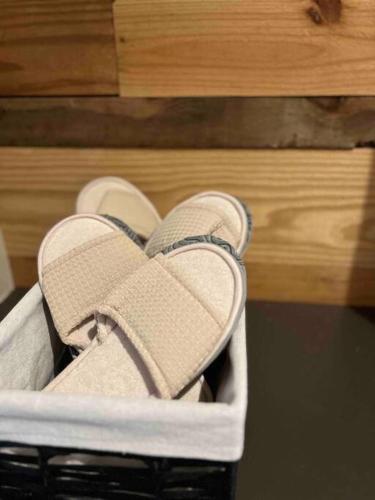 a pair of shoes sitting in a basket at Opulence is a way of life in Dallas
