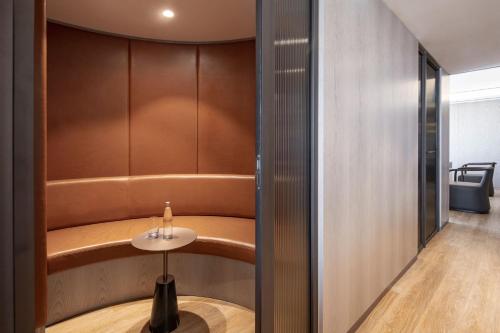 a wine tasting room with a table in a room at Sheraton Grand Tel Aviv in Tel Aviv