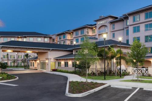 a parking lot in front of a building at Residence Inn by Marriott Near Universal Orlando in Orlando