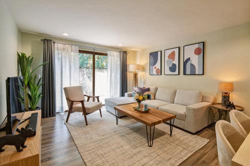 a living room with a couch and a table at Gated Community Home, Parking, Pool, Tennis court in San Miguel de Allende
