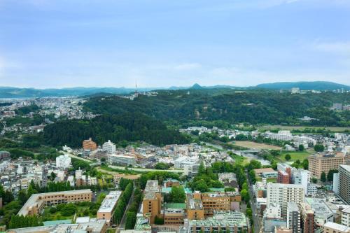 an aerial view of a city with buildings at The Westin Sendai in Sendai